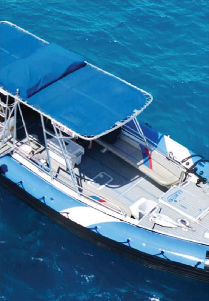 Aloha Kauwela 34-foot eco-raft vessel aerial view in turquoise waters